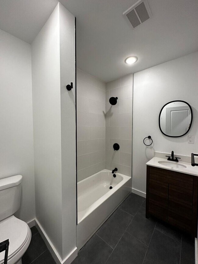 Building Photo - Renovated 2BR/2BA w/ Private Yard, Porch & In-Unit Laundry