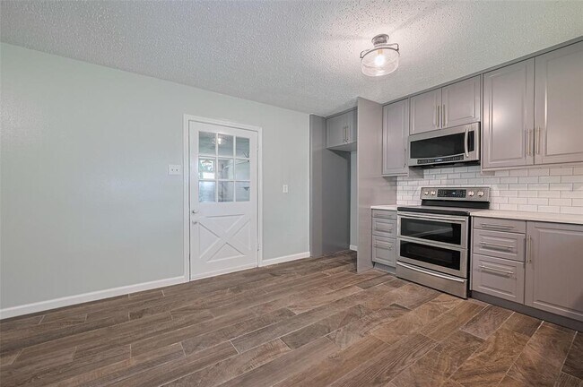 Building Photo - 9011 Bintliff Dr