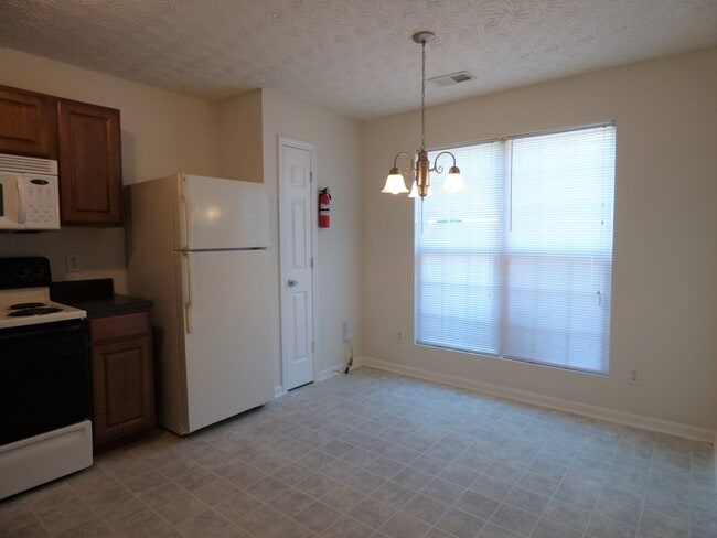 Building Photo - Incredible Brick Front Townhome in Regency Station