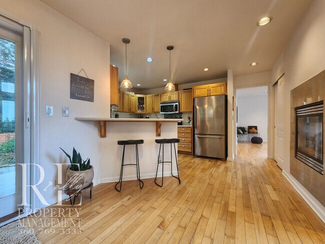 Building Photo - Light-Filled View Home with Vaulted Ceilings & Warm Wood Finishes
