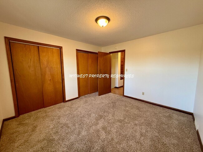 Building Photo - Spacious 3 Bedroom Home with Finished Lower Level & Large Fenced Yard