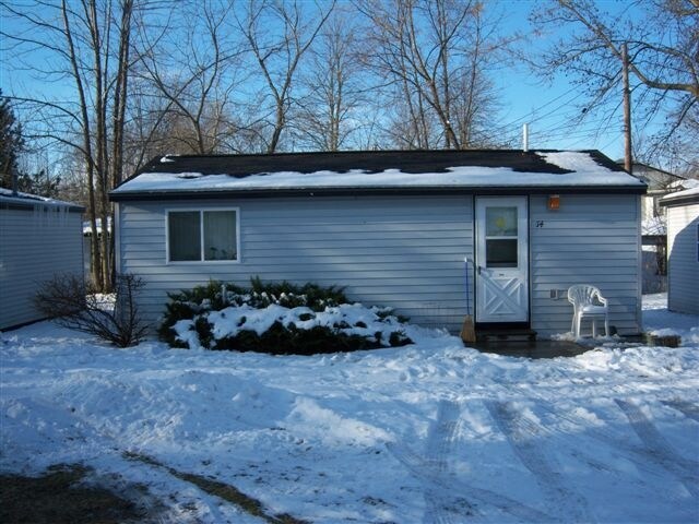 Building Photo - 6033-6055 W Houghton Lake Dr