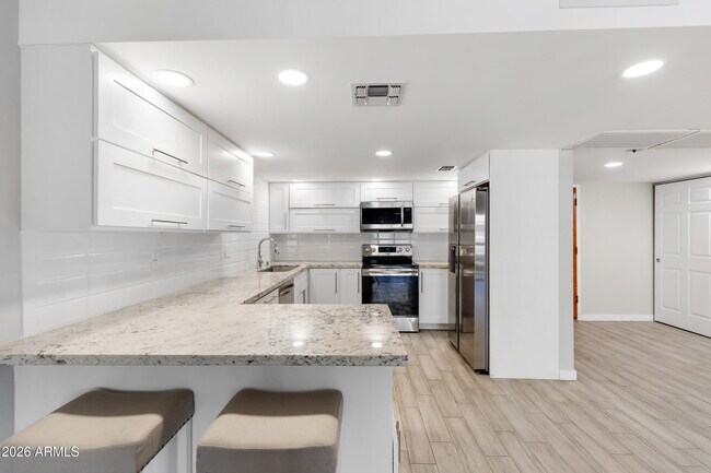 Building Photo - 7820 E Camelback Rd