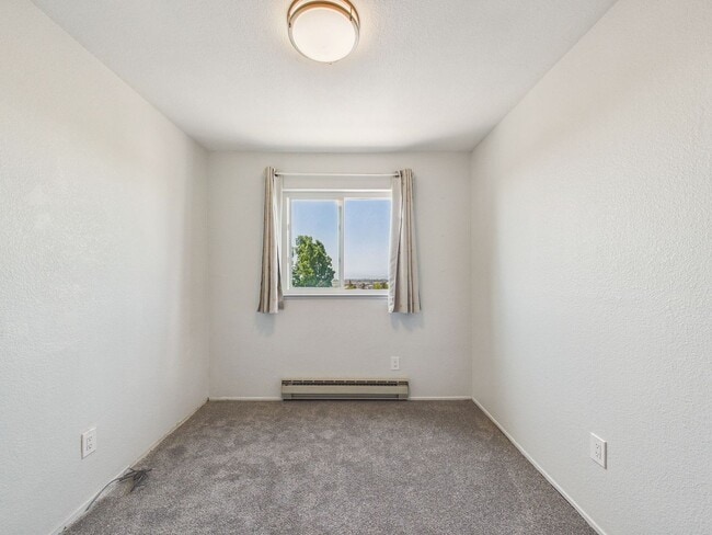 Building Photo - Updated 2 Bed / 1.5 Bath Townhome – In-Unit Washer & Dryer + Garage Parking – $2,800/month