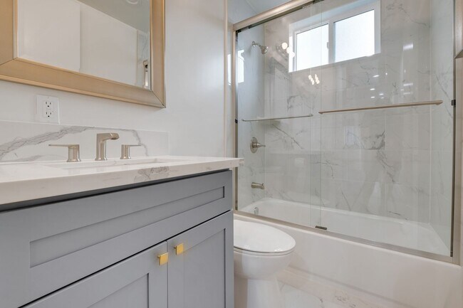 Building Photo - A beautifully designed and renovated 4 bed...