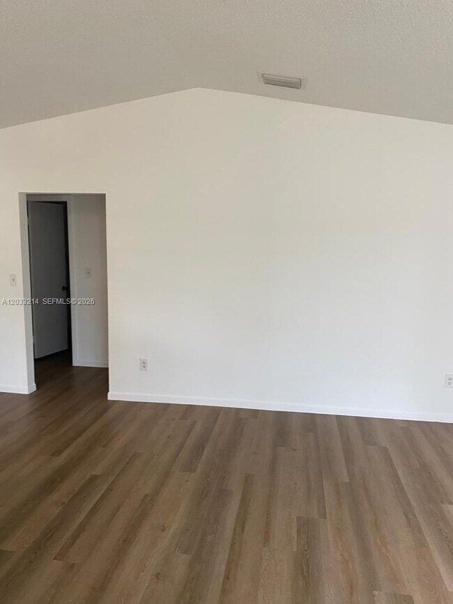 Building Photo - 9761 W Heather Ln