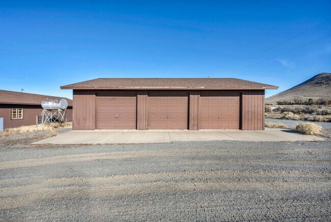Building Photo - 20 Acre Ranch with House, Barn, Separate Workshop, and 5-Car Garage