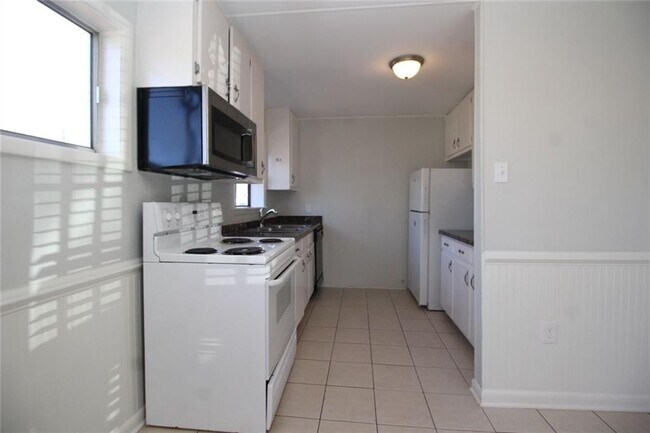 Building Photo - 9240 Nova Dr