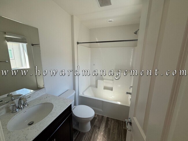 Building Photo - 3 Bed 3 Bath, Three Story Townhome with pr...