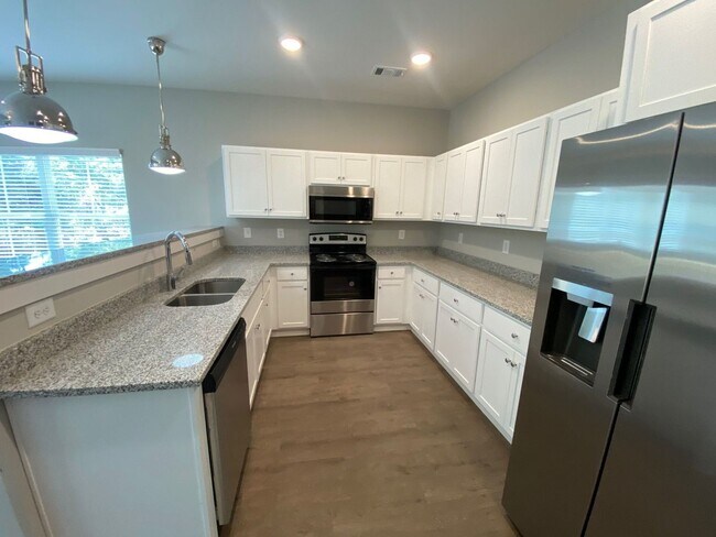 Building Photo - PRE LEASING FOR AUGUST 2026! NEW CONSTRUCT...