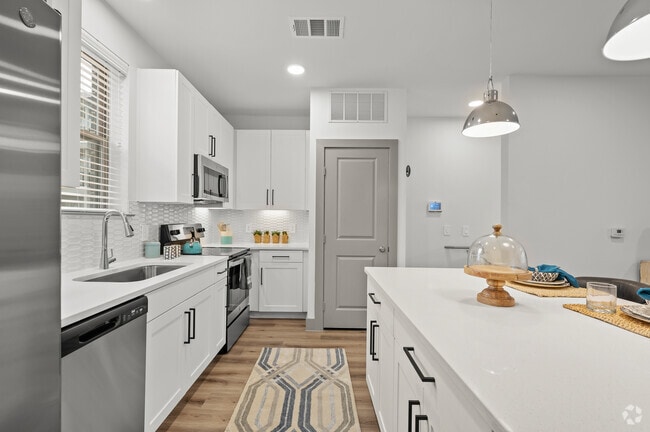 1BR, 1.5BA - 1,076SF Green Teal - The Overton