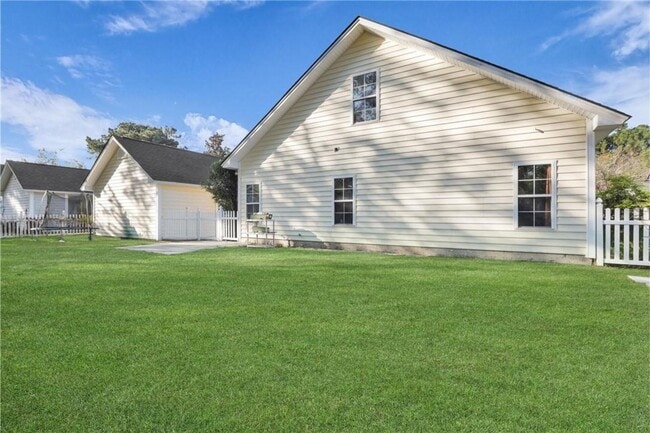 Building Photo - 4-Bedroom Home in Wild Heron with Front Porch and Fenced Yard