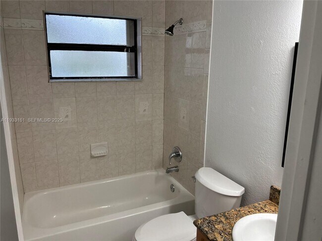 Building Photo - 6051 10th Ave N