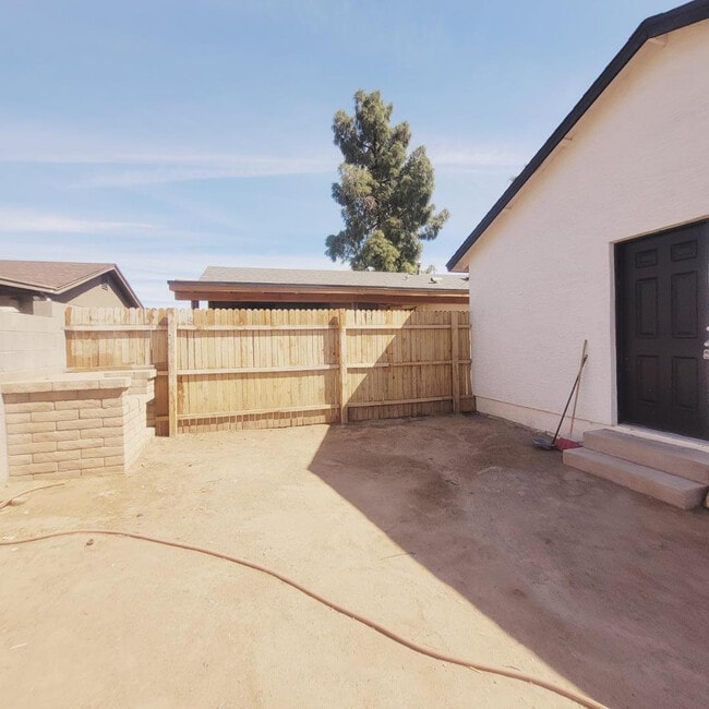 Building Photo - 7263 W College Dr