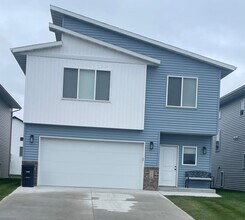 Building Photo - 4-bedroom, 3-bathroom South Fargo Single-Family Home w/ 2 Stall Garage