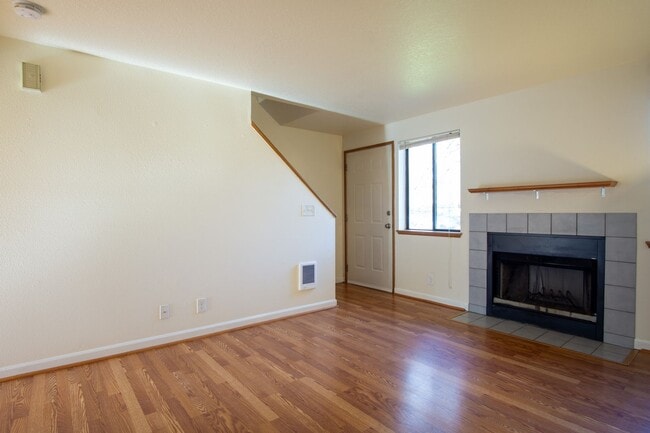 Building Photo - Updated Townhouse with Garage, Patio, DW, WD + FIREPLACE!!