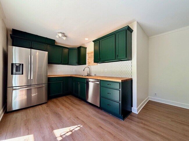 Building Photo - Charming West Nashville Condo with Designer Kitchen & Private Patio Access