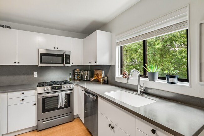 Large kitchen with huge windows! - 96 Ardmore Pl NW