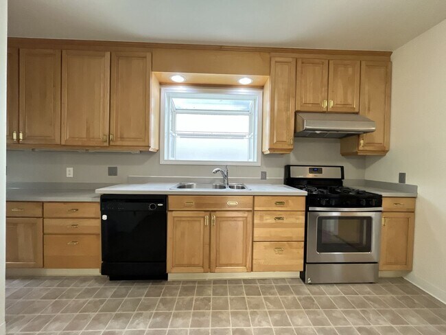 Building Photo - Character-Filled Concordia Home with Flexible Living Spaces & Gas Fireplace