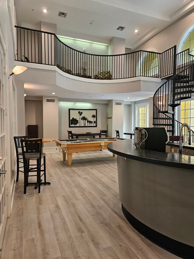 Building Photo - Beautiful large studio, private balcony overlooking pool!