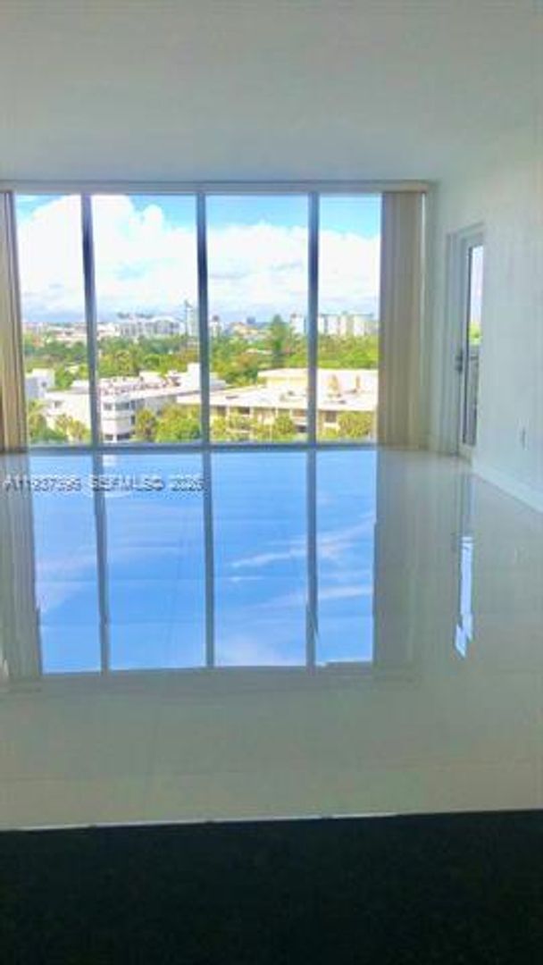 Building Photo - 10275 Collins Ave