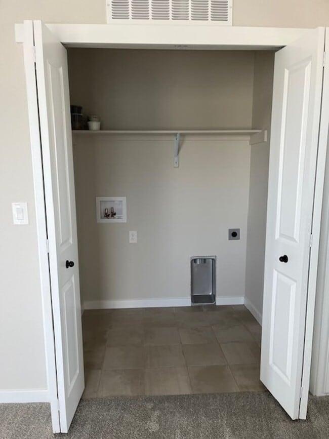 Building Photo - MODERN THREE STORY TOWNHOME WITH 2 CAR GAR...