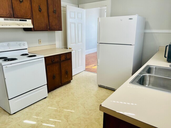 Kitchen (open door to bedroom 1) - 2602 Plum St
