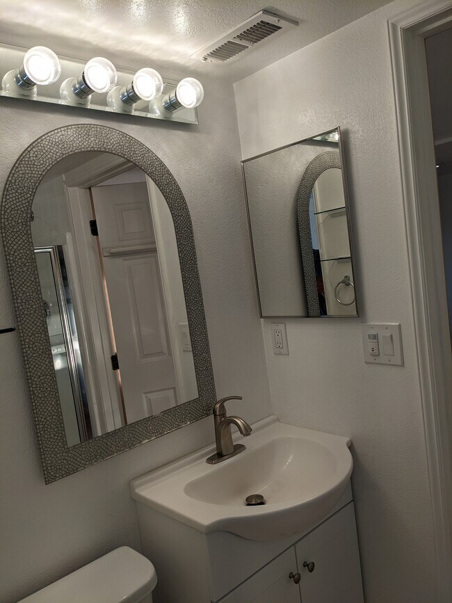 Vanity in bathroom. - 8261 Northrop Plz SW