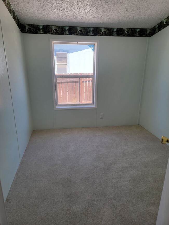 Building Photo - Bright 3-Bed, 2-Bath Home with Yard in 55+...