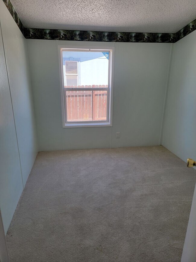 Building Photo - Bright 3-Bed, 2-Bath Home with Yard in 55+ Community!