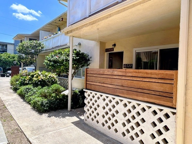 Side with attached private patio - 10739 Francis Pl