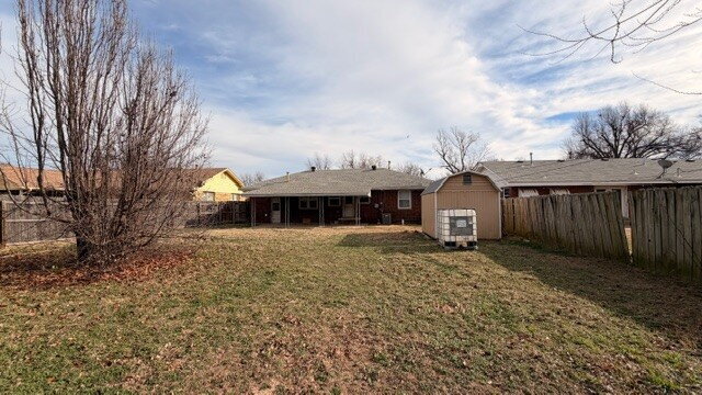 Building Photo - The Carport Cottage: Charming 3-Bedroom Brick Home Available Now.