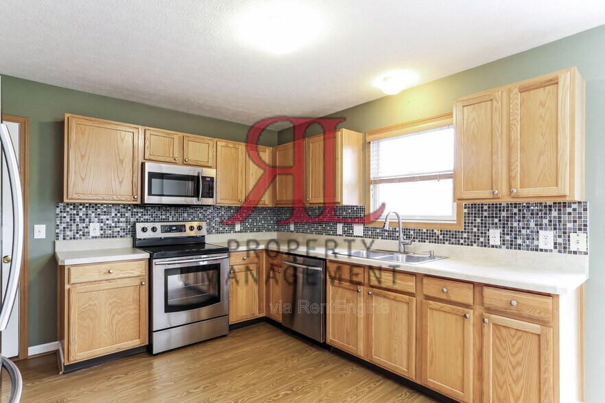 Building Photo - 8669 Brenstuhl Park Dr