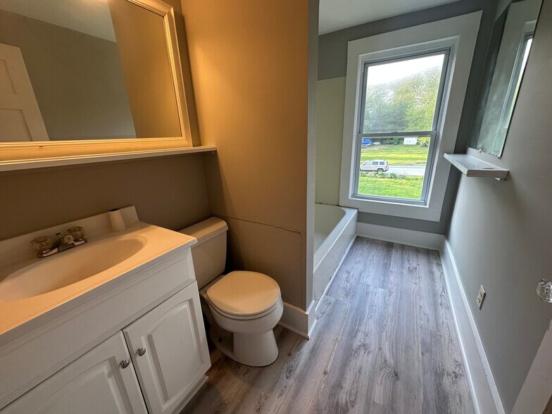 Upstairs bathroom with tub - 179 Maple Ave