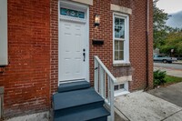 Building Photo - TAKE A SECOND LOOK AT THIS END-UNIT TOWNHOME