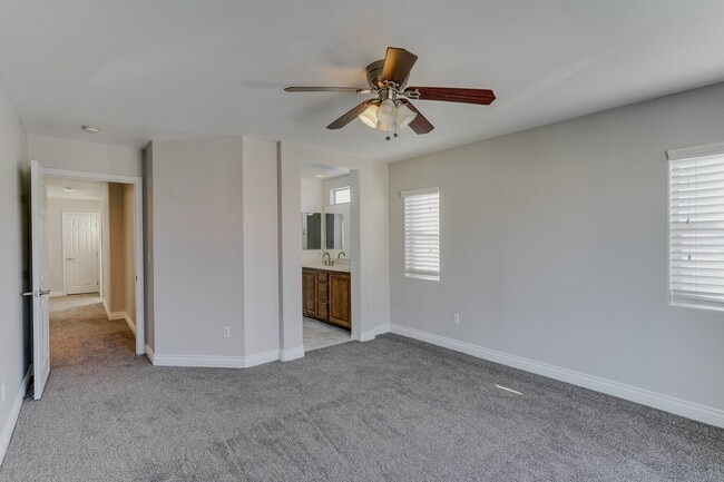 Building Photo - Gated Townhome with Strip Views from the Balcony!