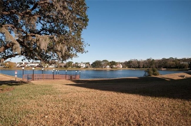 Building Photo - 2 Bedroom / 2 Bathroom Upstairs Condo with Large Screened Covered Porch