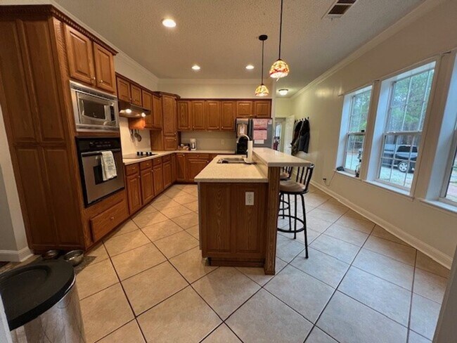 Building Photo - 6968 Moontown Dr E