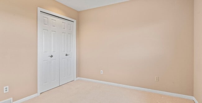 Building Photo - Lakefront End-Unit Condo with Crystal Lake...