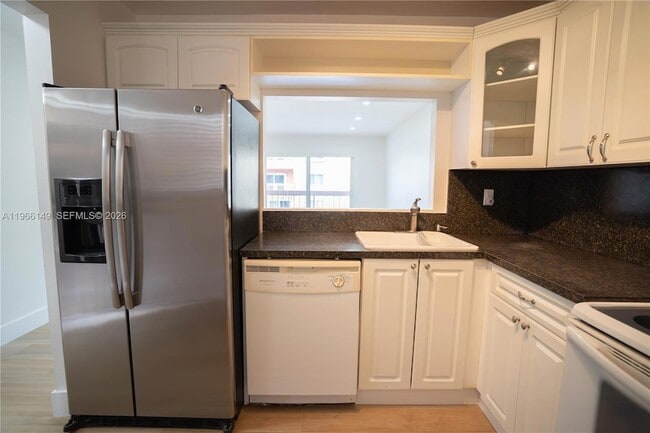 Building Photo - 7720 Camino Real