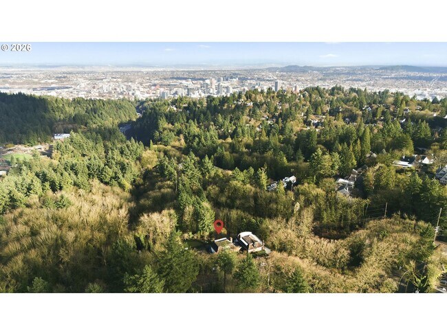 Building Photo - One-of-a-Kind 5BR Home with Floor-to-Ceiling Windows, Wraparound Decks & Breathtaking Treeline Views