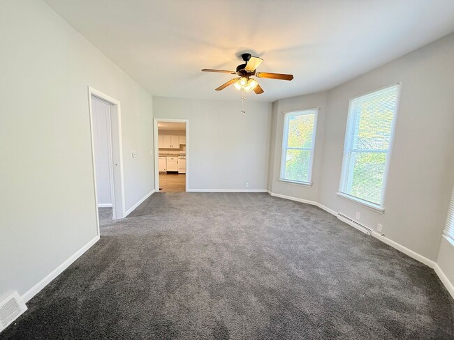 Building Photo - Spacious 4-Bedroom Home with Fenced Backyard