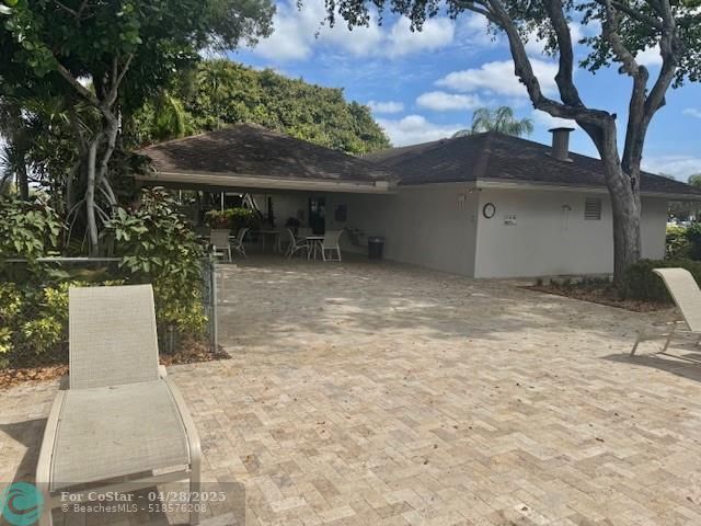 Building Photo - 3150 N Palm Aire Dr