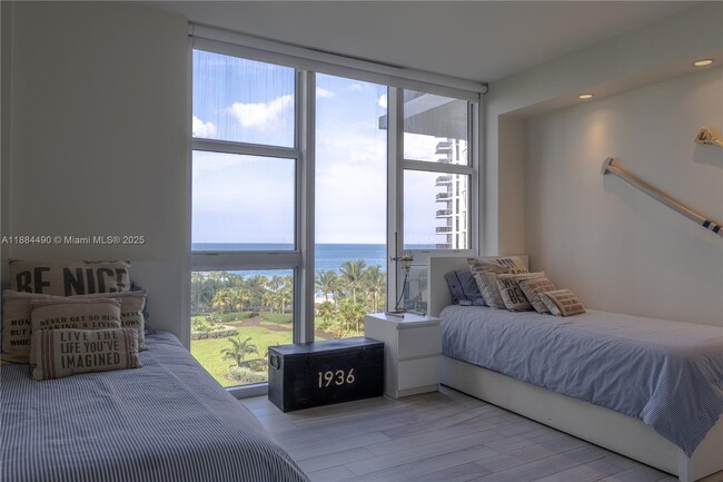 Building Photo - 10275 Collins Ave