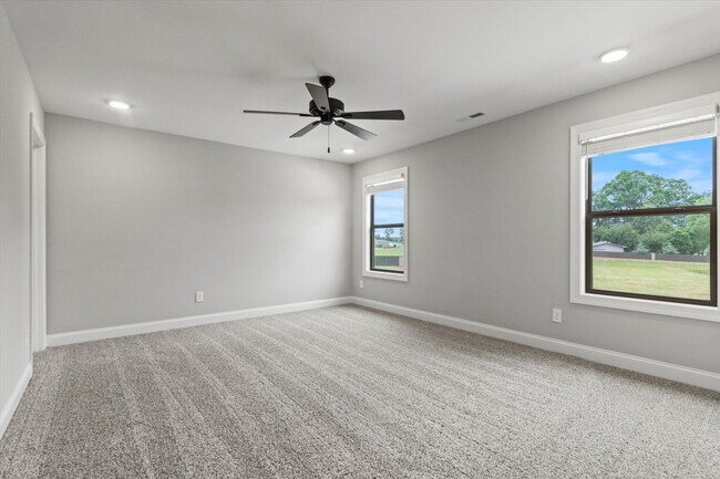 Building Photo - Stylish 4BR Townhome Living in the Heart o...