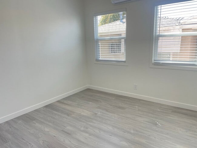 Building Photo - Location, Location, Location! Adorable Riverside Home Ready for Immediate Move In