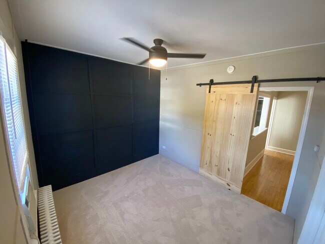 Bedroom with Accent Wall - 119 W State St