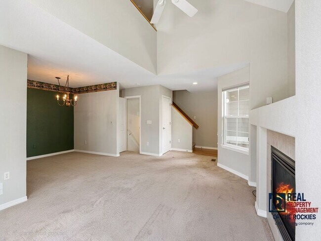 Building Photo - Charming Fort Collins Townhome with Private Patio, Vaulted Ceilings & Prime Location!