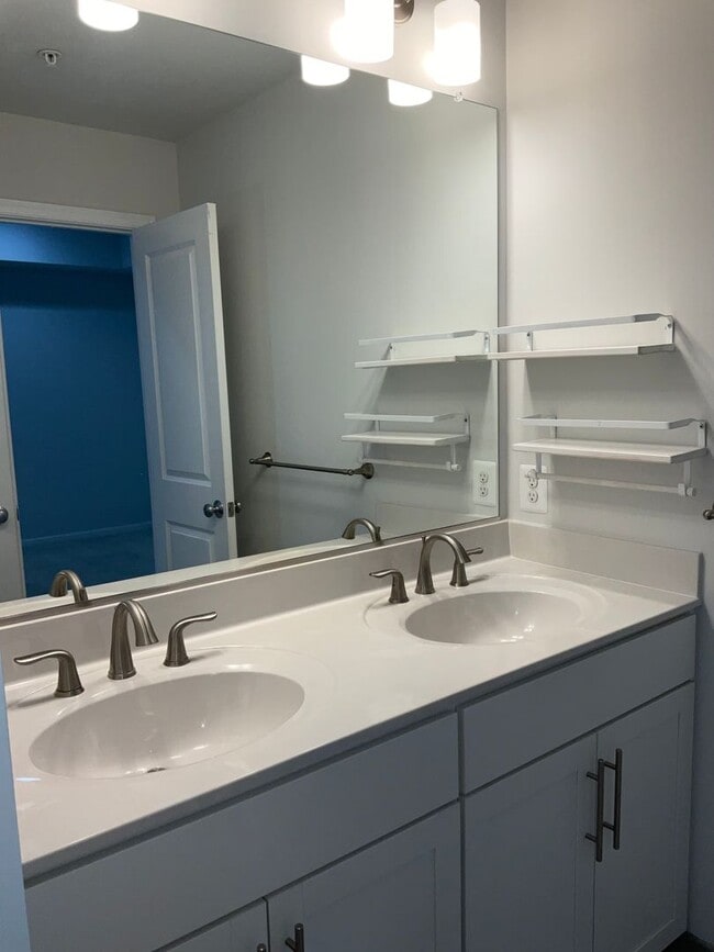 Building Photo - Beautiful 4BR 3.5BA 3 level townhome with 2 car attached garage located in the Cabin Branch Commu...