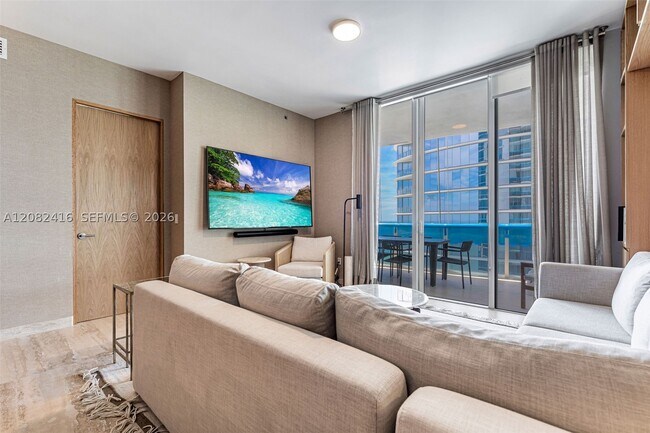 Building Photo - 15811 Collins Ave